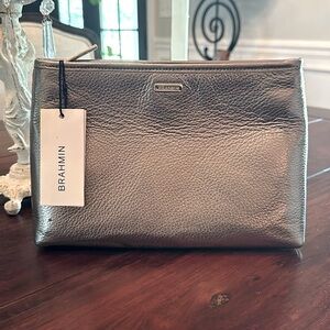 NWT Brahmin silver metallic leather clutch.